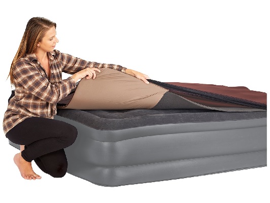 Woman and air mattress