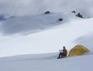 Setting Up Tent In Snow